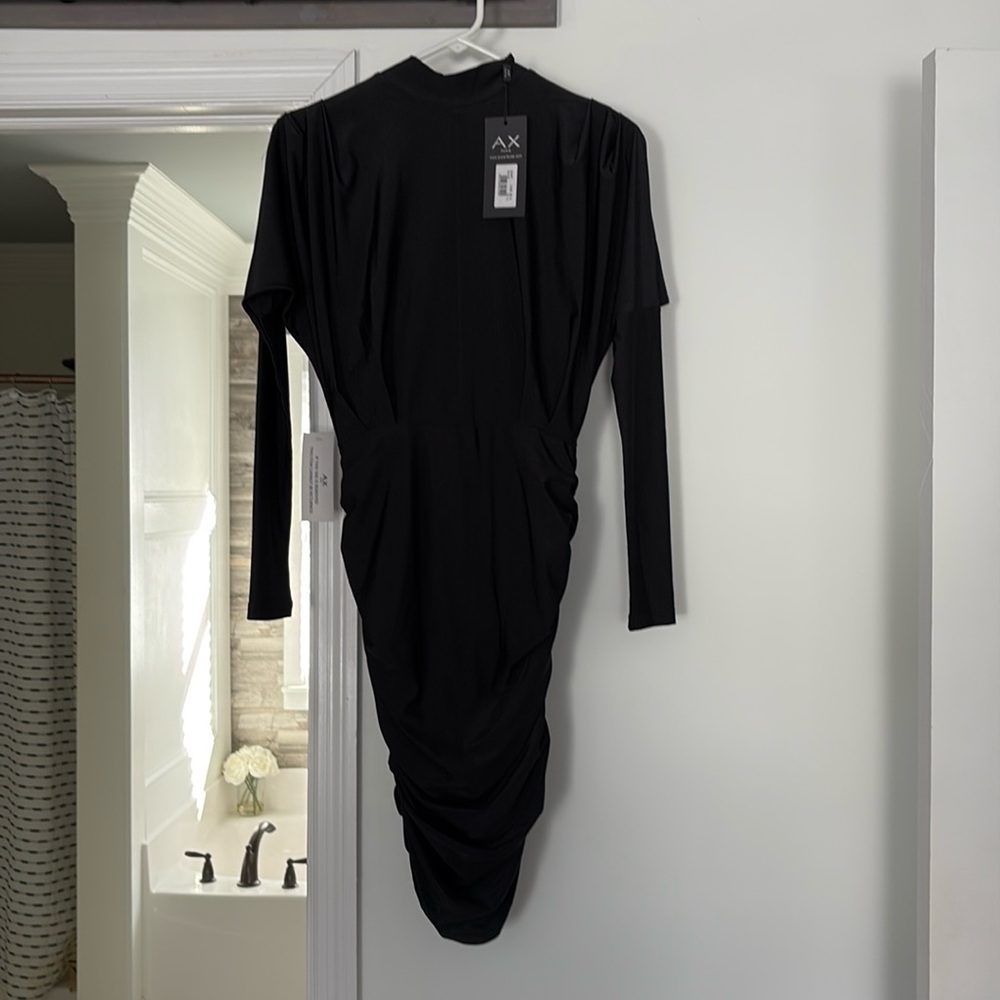 Long sleeve black dress
Size 4